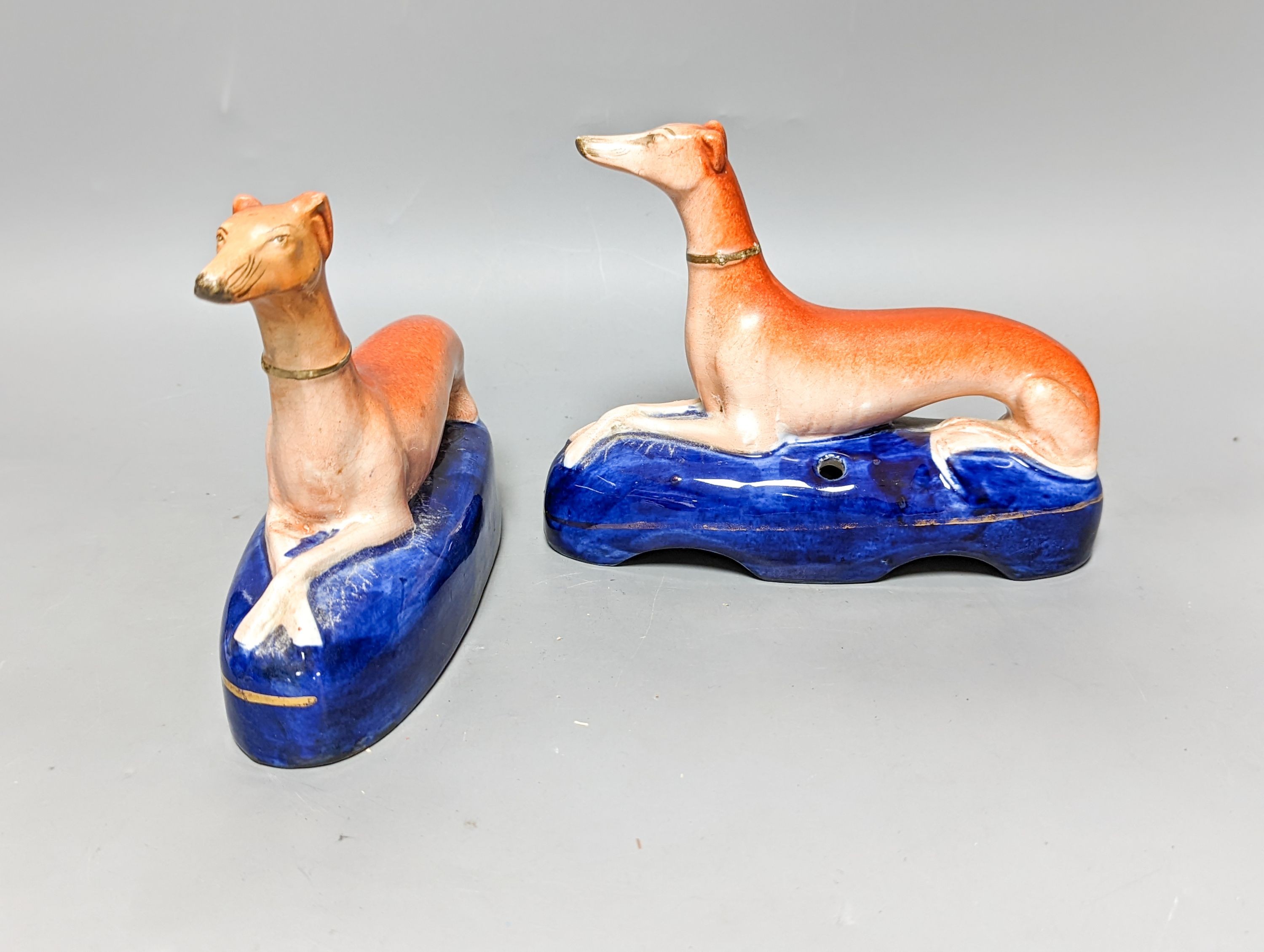 Two pairs of Staffordshire greyhounds, largest 19 cm long